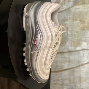 Nike Air Max in a size 7. Color is white, grey and red Nike and Air max